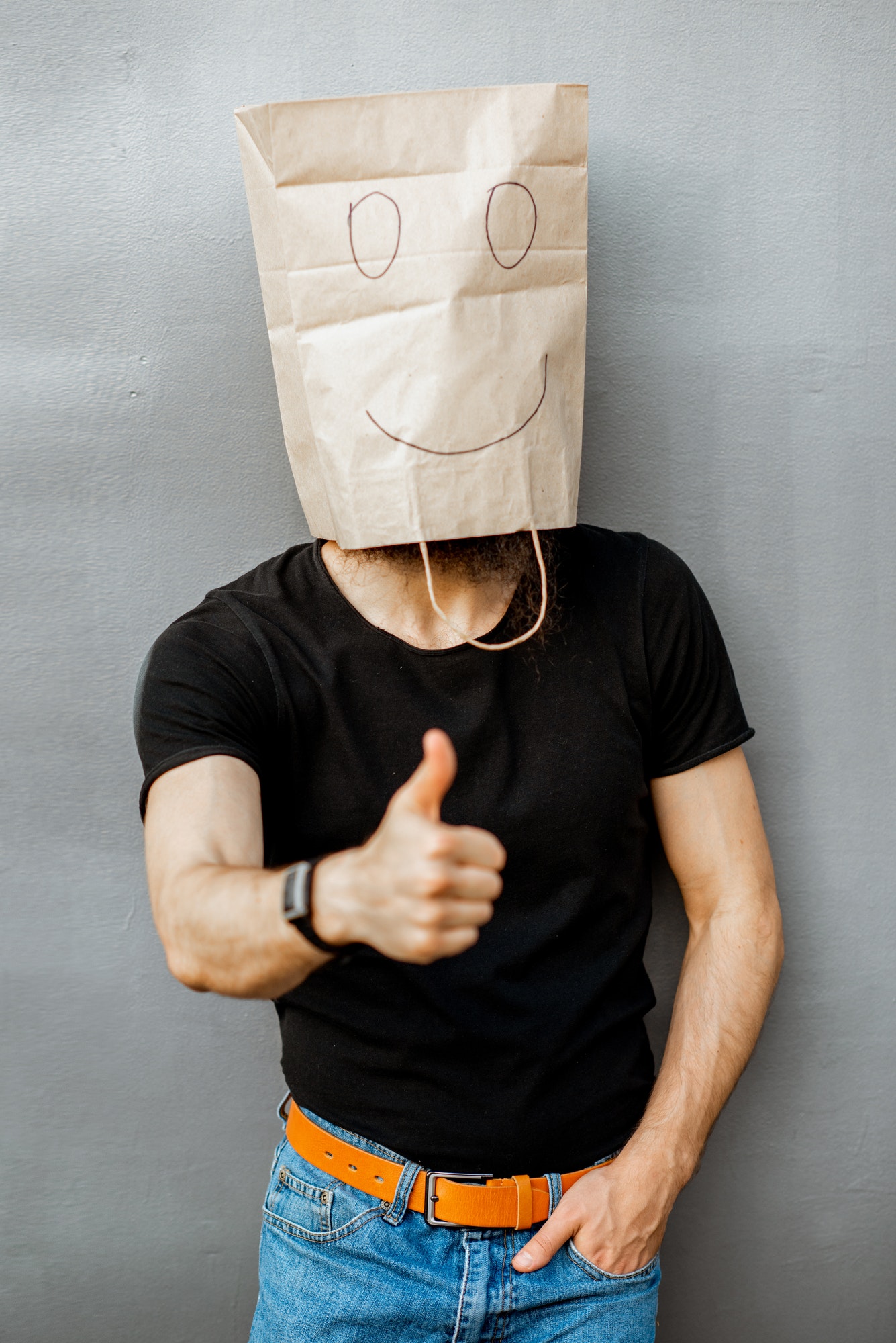 Man with paper bag on his head